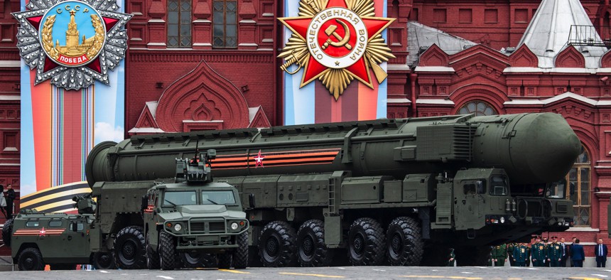 A Russian Topol-M intercontinental ballistic missile launcher rolls in Moscow, Russia, on May 9, 2019. 
