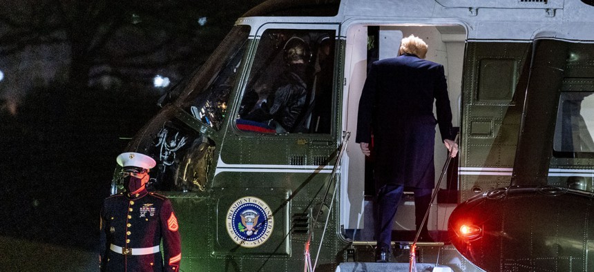President Donald Trump boards Marine One on the South Lawn of the White House in Washington, Monday, Jan. 4, 2021.
