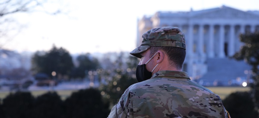 A Virginia National Guardsman stands near the Capitol building in Washington, D.C., Jan. 12, 2021. 