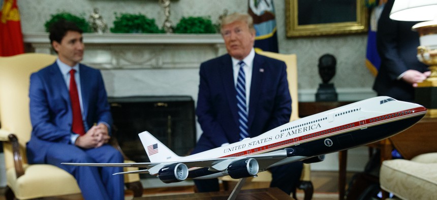 A model of the new Air Force One design sits on a table during a meeting between President Donald Trump and Canadian Prime Minister Justin Trudeau in the Oval Office of the White House, Thursday, June 20, 2019.