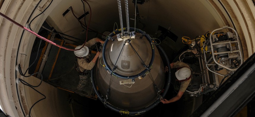 Airmen from the 90th Missile Maintenance Squadron prepare a reentry system for removal from a launch facility, Feb. 2, 2018, in the F. E. Warren Air Force Base missile complex.