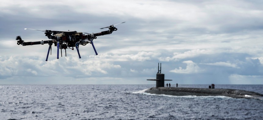 An unmanned aerial vehicle delivers a payload to the ballistic missile submarine USS Henry M. Jackson around the Hawaiian Islands, Oct. 19, 2020.