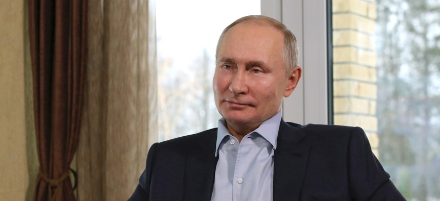 Russian President Vladimir Putin attends a meeting with university students marking Russian Students' Day via video conference in Zavidovo, 150 km (90 miles) north of Moscow, Russia, Monday, Jan. 25, 2021.