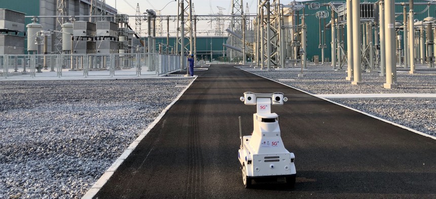 ZHUMADIAN, CHINA - AUGUST 27: A 5G intelligent robot inspects the equipment at a 800 kV ultra-high voltage (UHV) electrical substation operated by State Grid Henan Electric Power Co., Ltd on August 27, 2020 in Zhumadian, Henan Province of China. 