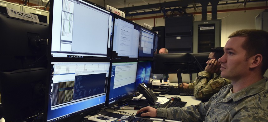 Tech. Sgt. Noe Kaur, a cyber-defense supervisor with the 1st Combat Communications Squadron, uses advanced techniques to launch cyber-attacks to the training audience as part of exercise TACET VENARI.