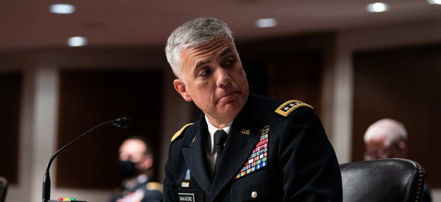  Gen. Paul M. Nakasone, Director of the National Security Agency listens during a Senate Armed Services Committee hearing March 25, 2021 on Capitol Hill in Washington DC.