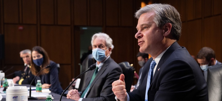  APRIL 14: FBI Director Christopher Wray testifies at a Senate Select Committee on Intelligence hearing on Capitol Hill on April 14, 2021 in Washington, DC.