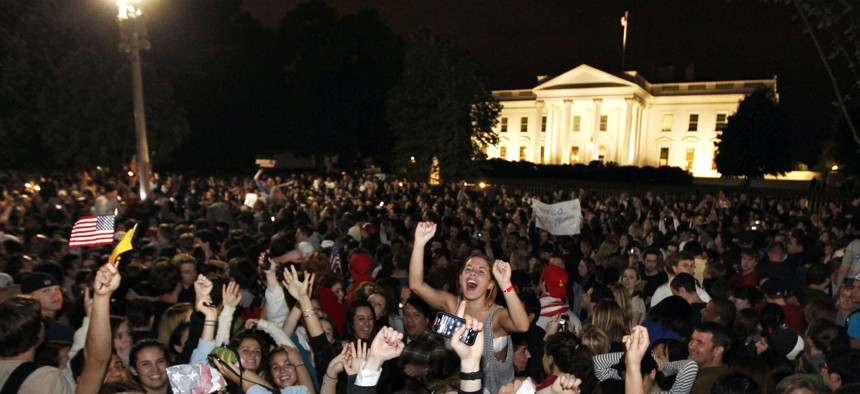 Crowds gathers outside the White House in Washington early Monday, May 2, 2011, to celebrate after President Barack Obama announced the death of Osama bin Laden.
