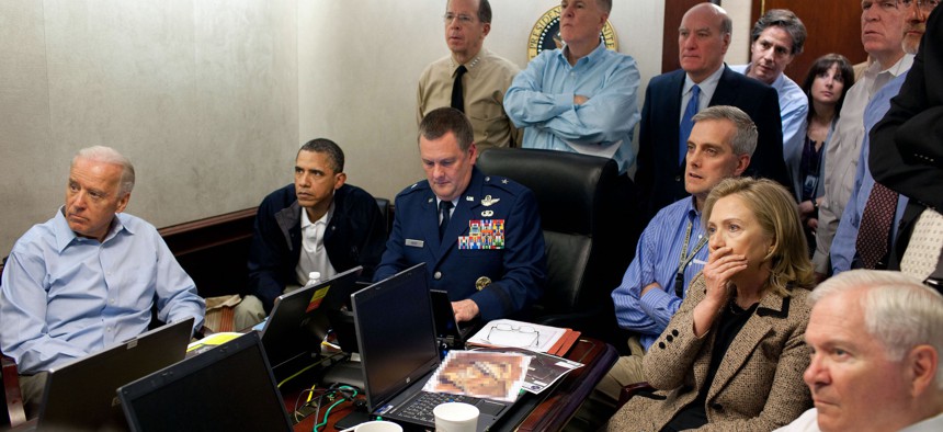 In this handout image provided by The White House, President Barack Obama, Vice President Joe Biden, Secretary of State Hillary Clinton and members of the national security team receive an update on the mission against Osama bin Laden in the Situation Room of the White House May 1, 2011 in Washington, DC