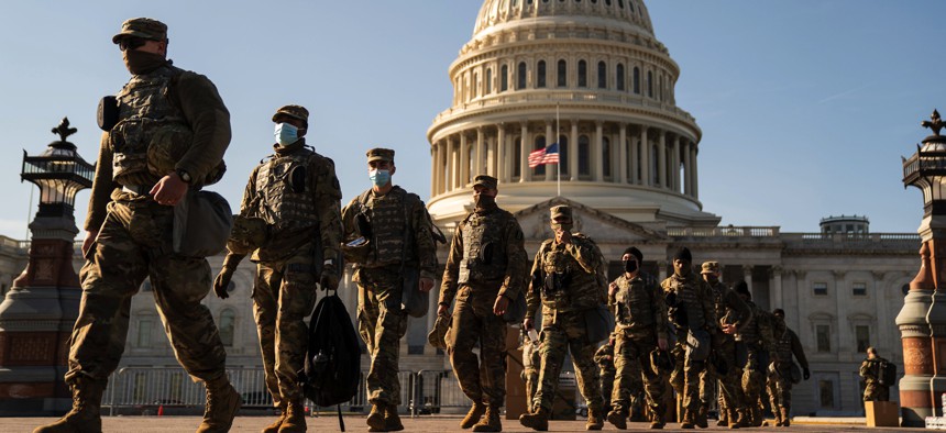 Members of the National Guard outside the U.S. Capitol on Jan. 14, 2021, a week after a pro-Trump insurrectionist mob breached its security.