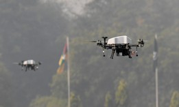 Members of offensive swarm drone system fly drones to demonstrate skills during a ceremony to celebrate India's 73rd Army Day in New Delhi on January 15, 2021. 