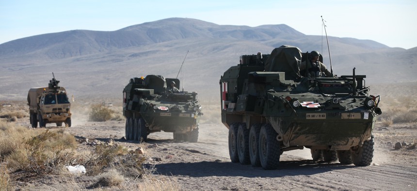 U.S. Army Strykers from 1st Stryker Brigade Combat Team, 25th Infantry Division, roll toward the Brigade Tactical Operations Center at the National Training Center, Ft. Irwin, CA., Jan. 17, 2017. 