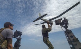Navy Special Warfare Combatant-Craft Crewmen from Naval Special Warfare launch an unmanned aerial system June 20, 2019, during a patrol on the Black Sea.