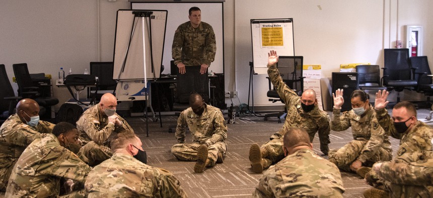 Soldiers participate in equal opportunity training at Fort Eustis, Virginia, June 23, 2020. 