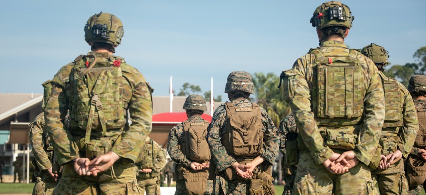 U.S. Marines, Australian soldiers and Japanese Self-Defense Force members come together to commemorate an official opening ceremony for the beginning of exercise Southern Jackaroo, June 15, 2021. 