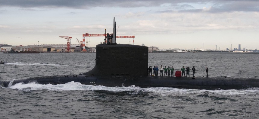 The Virginia-class fast-attack submarine USS Texas (SSN 775) transits Tokyo Bay before arriving at Fleet Activities Yokosuka in December 2015.