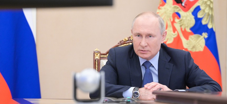 Russia's President Vladimir Putin meets with graduates of the Management Personnel Pool programme of the Graduate School of Public Administration at the Russian Presidential Academy of National Economy and Public Administration (RANEPA), via a video linkup from the Moscow Kremlin on June 17, 2021.