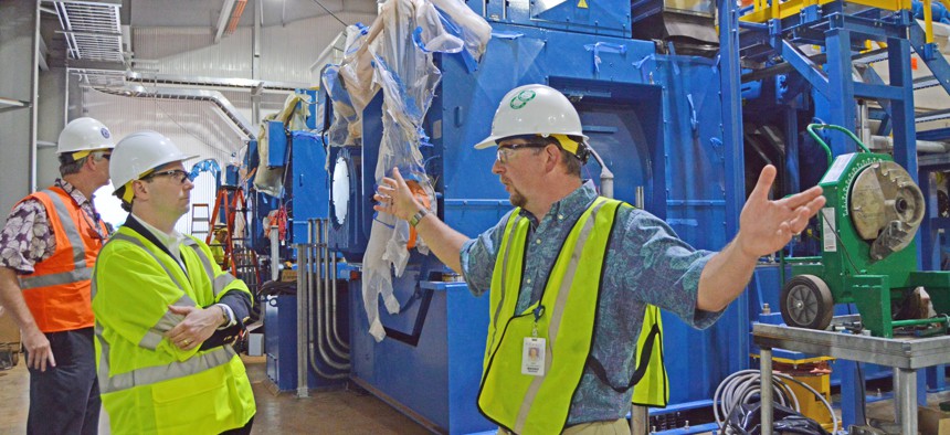 Hawaiian Electric Co. Manager of Generation Project Development Jack Shriver gives a tour of the Schofield Barracks Generating Station in 2018. 