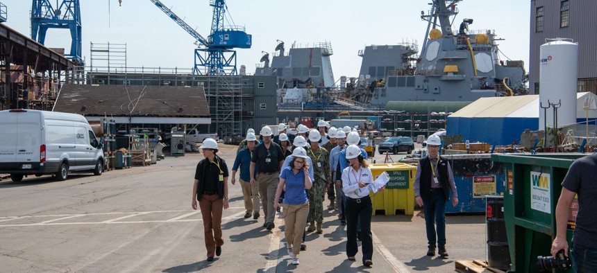 Deputy Defense Secretary Kathleen Hicks, Sen. Angus King, and Rep. Jared Golden visited the Bath Iron Works shipyard in Bath, Maine, July 7, 2021. 