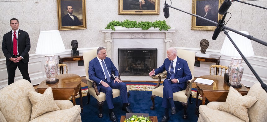 President Joe Biden hosts Iraqi Prime Minister Mustafa Al-Kadhimi for a bilateral meeting in the Oval Office at the White House on July 26, 2021. 