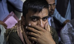 Afghan Special Immigrant Visa applicants crowd into the Herat Kabul Internet cafe to apply for the SIV program on August 8, 2021, in Kabul, Afghanistan. 