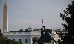 The U.S. flag flies at half mast over the White House after President Joe Biden delivered remarks on the terror attack at Hamid Karzai International Airport, and the U.S. troops and Afghan victims killed and wounded, August 26, 2021. 