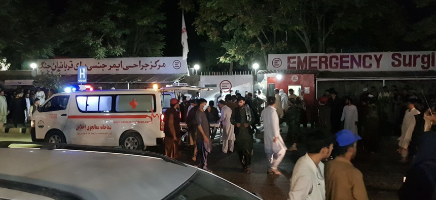 Injured people being carried to a hospital after explosions outside Hamid Karzai International Airport in Kabul, Afghanistan, on August 26, 2021. 