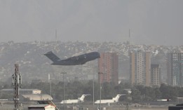 A U.S. plane leaves Kabul airport as evacuations continue, a day after an explosion outside a crowded airport gate in Afghanistan on August 27, 2021. 