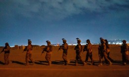 Taliban fighters, wielding U.S.-supplied weapons, equipment, and uniforms, storm into the Kabul airport to secure the airport and inspect the equipment that was left behind after the U.S. military withdrawal, in Afghanistan, Aug. 31, 2021. 