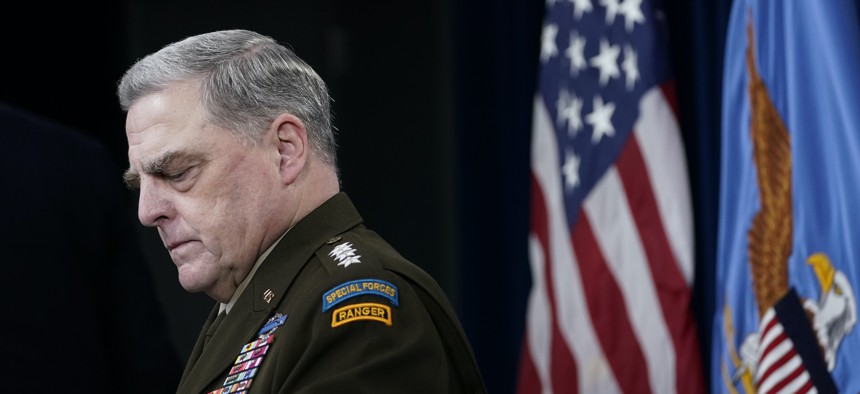 Joint Chiefs of Staff Gen. Mark Milley listens during a briefing with Secretary of Defense Lloyd Austin at the Pentagon in Washington, Wednesday, Sept. 1, 2021, about the end of the war in Afghanistan. 