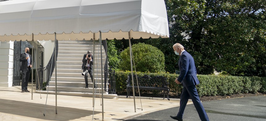 President Joe Biden arrives at the White House in Washington, Sept. 20, 2021, after returning from Rehoboth Beach, Del.