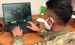 U.S. Air Force Master Sgt. Shane Keahiolalo, 169th Air Defense Squadron, Hawaii Air National Guard, tests a new training system that includes artificial intelligence, machine learning, and biometric capabilities, at Joint Base Lewis-McChord, Washington, Aug. 26, 2021. 