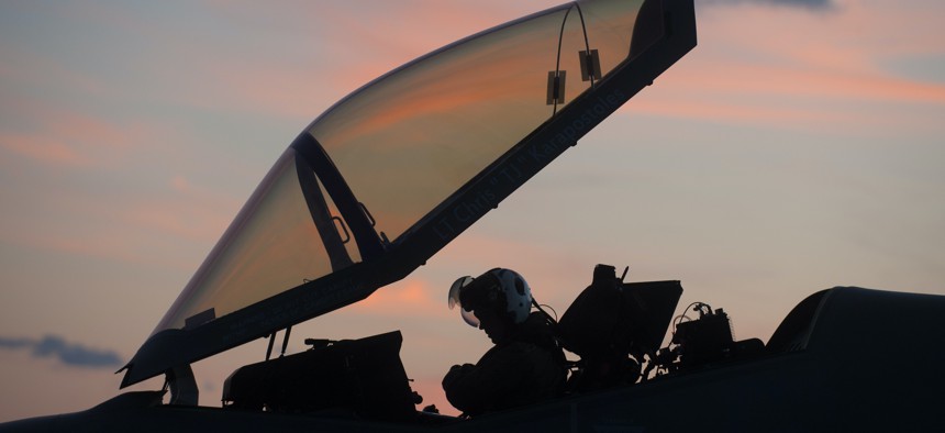 An F-35 test pilot prepares to commence night operations aboard USS Dwight D. Eisenhower, Oct. 8, 2015.