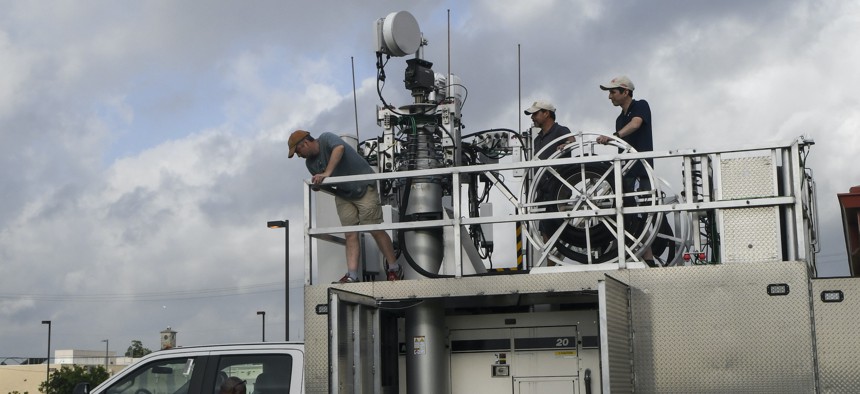 U.S. Army staff troubleshoot the 5th Generation Cell on Light Truck (5G CoLT), during a week-long training event, held June 21-25, 2021, at Joint Base San Antonio-Fort Sam Houston.