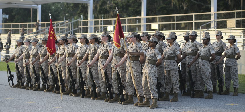 U.S. Marine Corps recruits with Platoon 4027, Oscar Company, 4th Battalion, Recruit Training Regiment, stand in formation during a final drill evaluation at Peatross parade deck on Marine Corps Recruit Depot, Parris Island, S.C., July 19, 2017. 