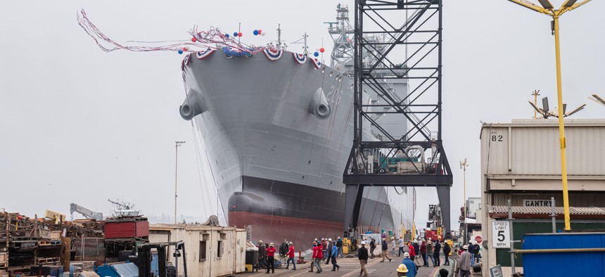 USNS Harvey Milk departs the General Dynamics NASSCO shipyard after the ceremonial address in San Diego, California, on November 6, 2021.