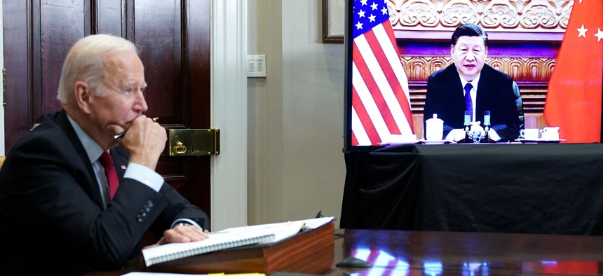 President Joe Biden meets with China's President Xi Jinping during a virtual summit from the Roosevelt Room of the White House in Washington, DC, November 15, 2021. 