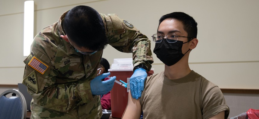 U.S. Army Cadet Thomas Cragg, assigned to the Bowie State University ROTC, receives the COVID-19 vaccination at Bowie State University, at Bowie, Maryland, Apr. 26, 2021.