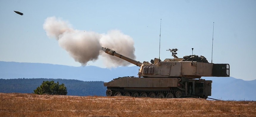 Soldiers of the 3rd Armored Brigade Combat Team, 4th Infantry Division, fire an engagement during gunnery table XII platoon qualification, Oct. 27, 2021, at Fort Carson, Colorado.