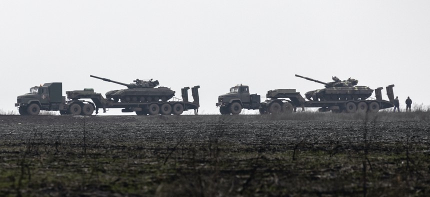 Ukrainian tanks are transported towards to the Luhansk region, Ukraine, Dec. 12, 2021.