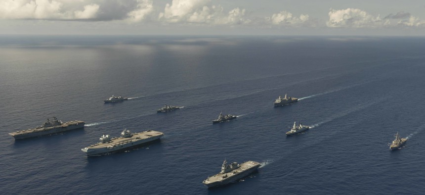 Ships from the United Kingdom Carrier Strike Group and the USS America Expeditionary Strike Group, with the embarked 31st Marine Expeditionary Unit (MEU), begin multinational advanced aviation operations in support of Large Scale Global Exercise (LSGE) 21, Aug. 20, 2021.