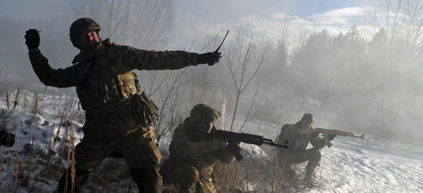 Ukrainian Territorial Defense Forces, the military reserve of the Ukrainian Armes Forces, take part in a military exercise near Kiev on December 25, 2021.