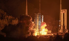 A Long March 3B carrier rocket carrying an experimental satellite blasts off from the Xichang Satellite Launch Center on December 30, 2021 in Xichang, China.