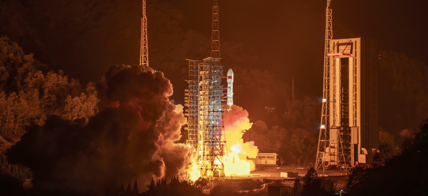 A Long March 3B carrier rocket carrying an experimental satellite blasts off from the Xichang Satellite Launch Center on December 30, 2021 in Xichang, China.