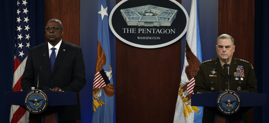 U.S. Secretary of Defense Lloyd Austin (L) and Chairman of the Joint Chief of Staff Army Gen. Mark Milley (R) hold a news briefing at the Pentagon on January 28, 2022.