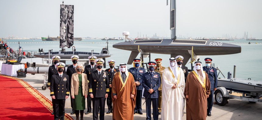 His Royal Highness Prince Salman bin Hamad Al-Khalifa, Crown Prince, Deputy Supreme Commander and Prime Minister of Bahrain, front center; Vice Adm. Brad Cooper, commander of U.S. Naval Forces Central Command, U.S. 5th Fleet and Combined Maritime Forces, left of previous; and Maggie Nardi, charge d’affaires, U.S. Embassy to Bahrain, left of previous, pose for a photo with U.S. and Bahrain officials at Naval Support Activity (NSA) Bahrain, Jan. 31.