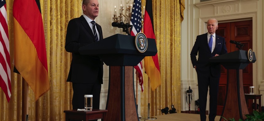 German Chancellor Olaf Scholz speaks during a joint news conference with U.S. President Joe Biden in the East Room of the White House on February 7, 2022 in Washington, D.C.