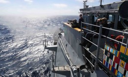 Ticonderoga-class guided-missile cruiser USS Mobile Bay (CG 53) fires a Mark 45 5-Inch gun system during a naval surface fire support exercise in support of Jungle Warfare Exercise 22 (JWX 22) across Okinawa, Japan.