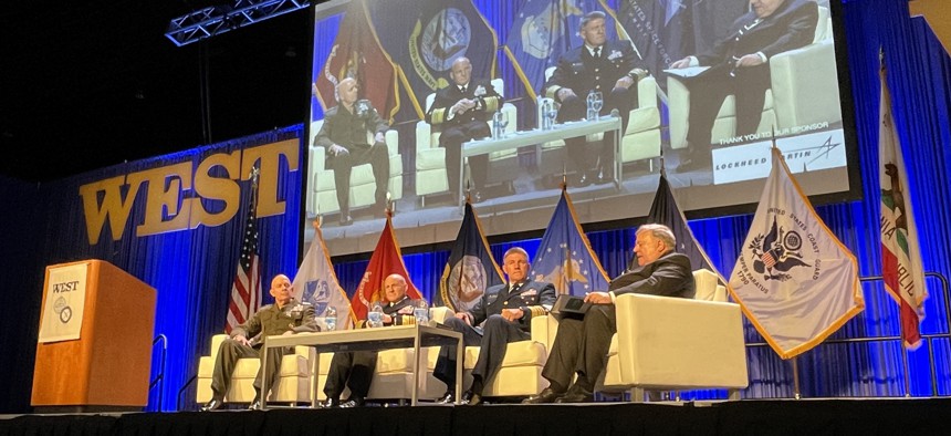 Gen. David Berger, Marine Corps Commandant, left; Adm. Michael Gilday, chief of naval operations; Adm. Karl Schultz, Coast Guard commandant; and Peter Daly, Naval Institute CEO, speak at WEST 2022.