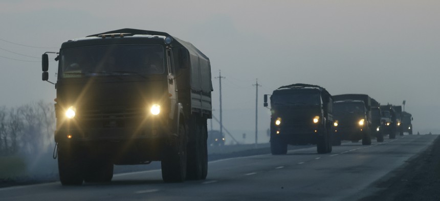 A convoy of Russian military vehicles is seen as the vehicles move towards border in Donbas region of eastern Ukraine on February 23, 2022, in the Russian border city of Rostov.